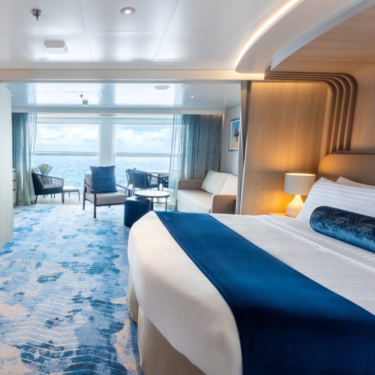 Elevate your stateroom experience with a Grand Suite, more space and a large balcony overlooking the Caribbean Sea